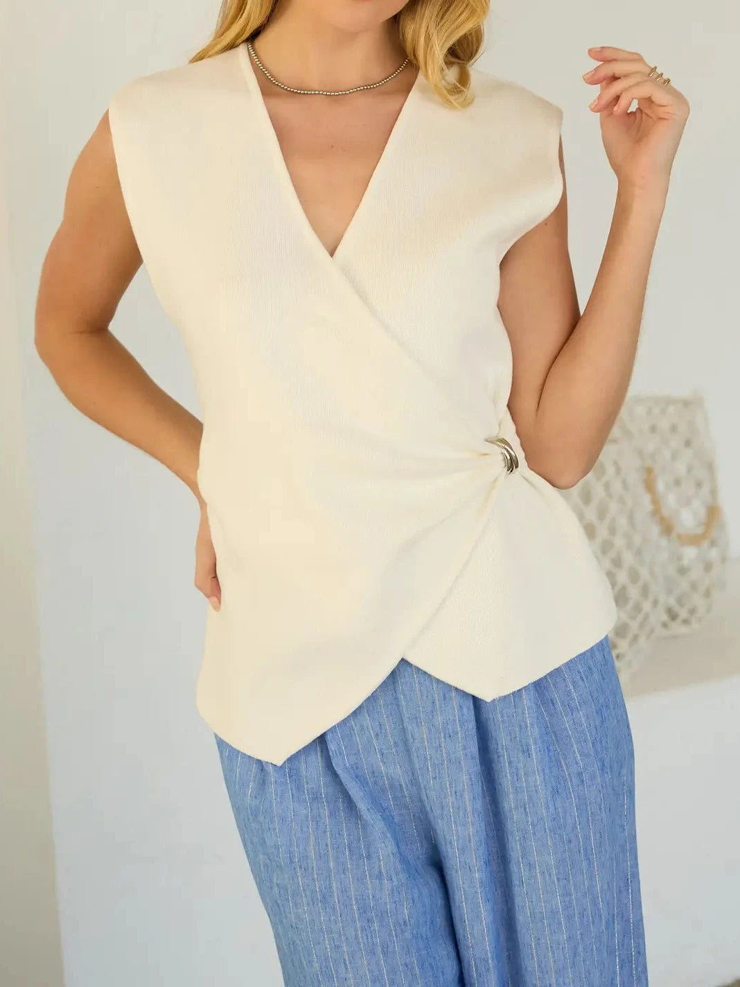 Sadie Sleeveless V-Neck Knit Wrap Top with Side-Buckle Detail