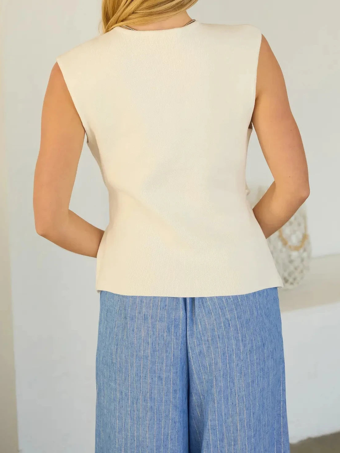 Sadie Sleeveless V-Neck Knit Wrap Top with Side-Buckle Detail
