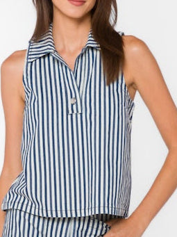 Woman wearing a navy and white striped sleeveless top and shorts on a white background